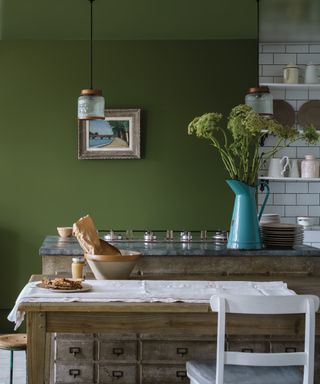 Kitchen painted in green paint by Farrow & Ball