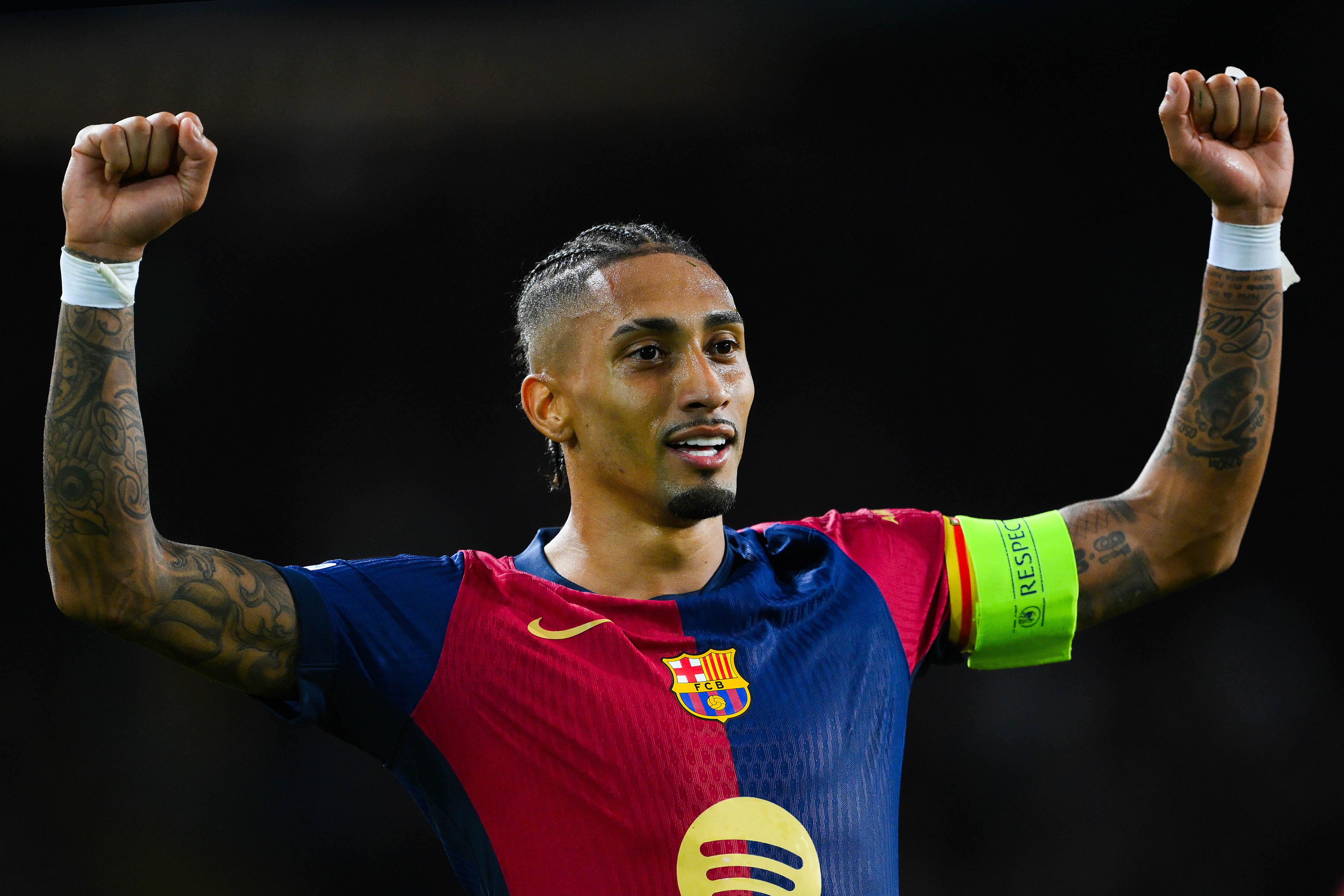 Raphinha celebrates after scoring Barcelona's third goal against Bayern Munich in the Champions League in October 2024.