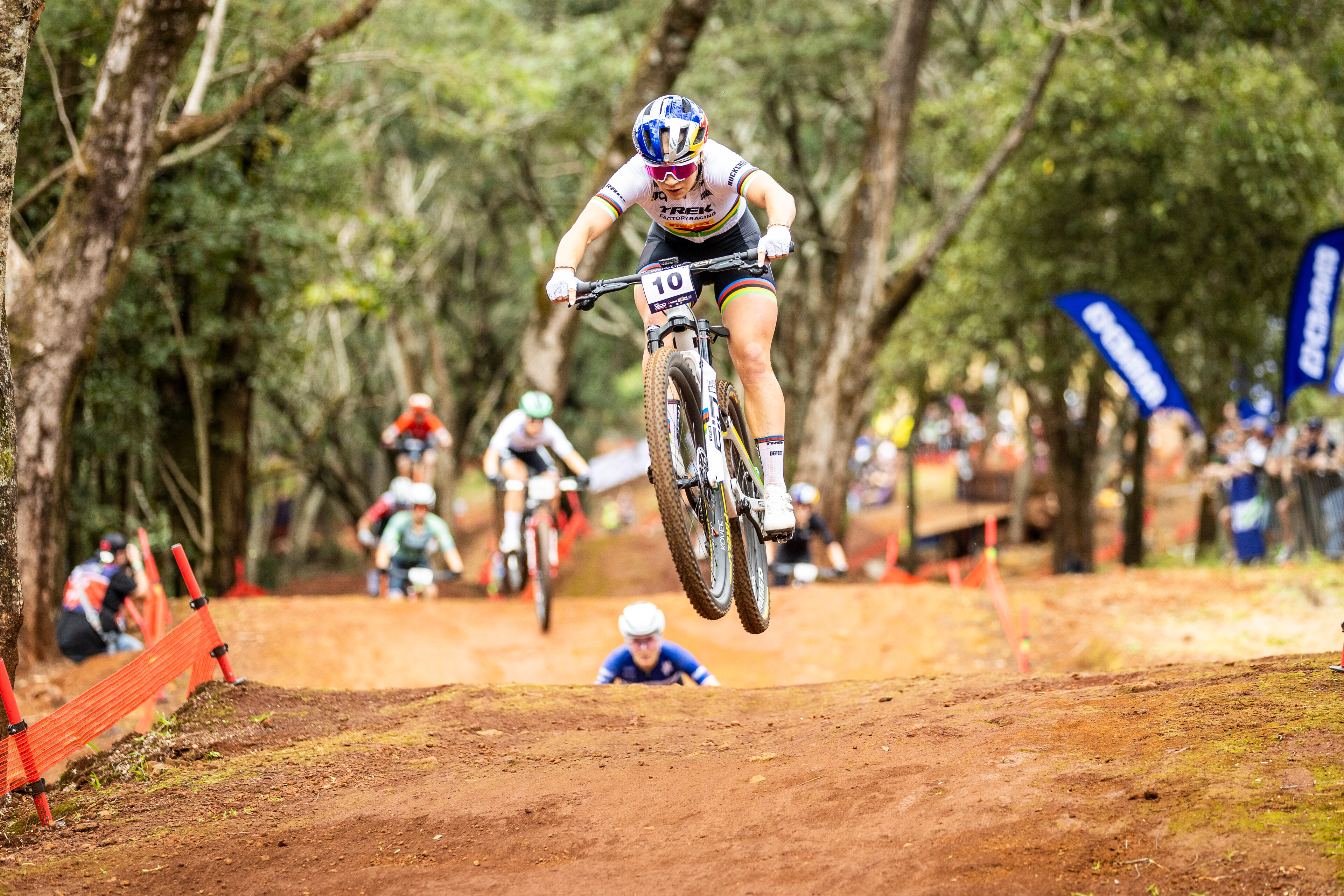 Evie Richards jumps during a MTB race