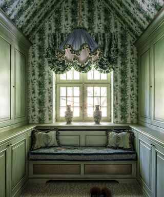 seating area with inbuilt bench and pattern on walls and blinds