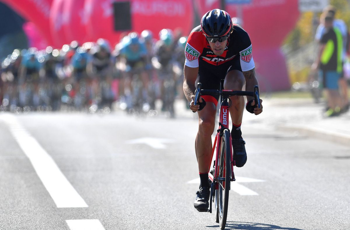 Daniel Oss (BMC) flying away from the peloton