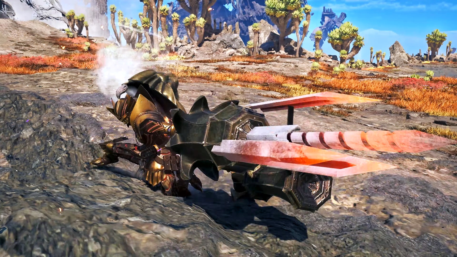 A heavily armored warrior in golden gear kneels on rocky ground, wielding a large, mechanical weapon with glowing orange, blade-like protrusions.