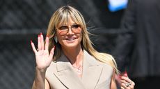 Heidi Klum in beige waving