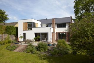 house render has been used to unite the new extension to the existing house