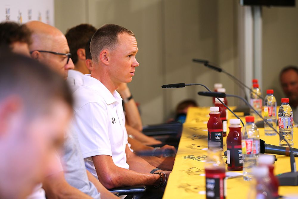 Chris Froome talks with members of the media at Team Sky's pre-Tour press conference