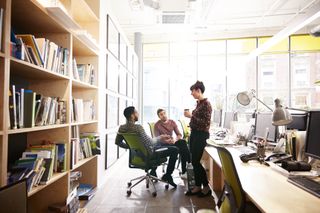 People meeting up at work indoors, after rules change on how many people can meet outside and indoors