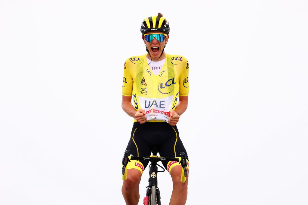 SAINTLARYSOULAN COL DU PORTET FRANCE JULY 14 Tadej Pogaar of Slovenia and UAETeam Emirates Yellow Leader Jersey celebrates at arrival during the 108th Tour de France 2021 Stage 17 a 1784km stage from Muret to SaintLarySoulan Col du Portet 2215m LeTour TDF2021 on July 14 2021 in SaintLarySoulan Col du Portet France Photo by Michael SteeleGetty Images