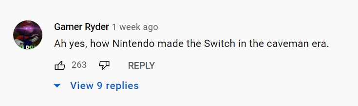 A screenshot of a comment on the 'Wooden Nintendo Switch' YouTube video. "Ah yes, how Nintendo made the Switch in the caveman era."