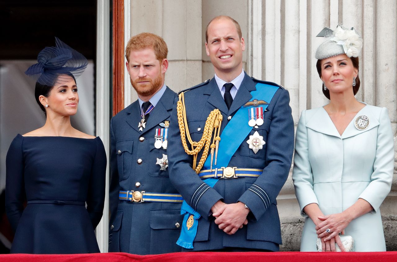 LONDON, UNITED KINGDOM - JULY 10: (EMBARGOED FOR PUBLICATION IN UK NEWSPAPERS UNTIL 24 HOURS AFTER CREATE DATE AND TIME) Meghan, Duchess of Sussex, Prince Harry, Duke of Sussex, Prince William, Duke of Cambridge and Catherine, Duchess of Cambridge watch a flypast to mark the centenary of the Royal Air Force from the balcony of Buckingham Palace on July 10, 2018 in London, England. The 100th birthday of the RAF, which was founded on on 1 April 1918, was marked with a centenary parade with the presentation of a new Queen&#039;s Colour and flypast of 100 aircraft over Buckingham Palace. (Photo by Max Mumby/Indigo/Getty Images)