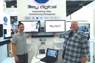 The Key Digital team showcasing conference room in a box at ISE 2024.