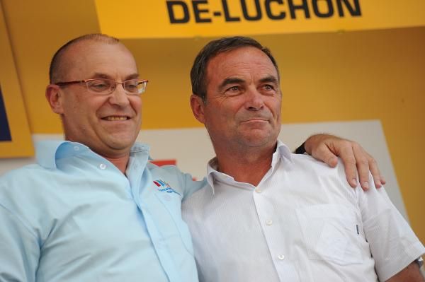 An emotional moment as Laurent Fignon and Bernard Hinault share the podium