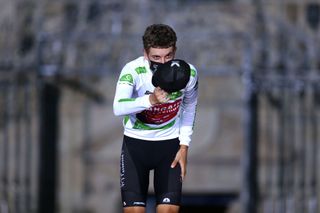 Gino Mader bows to the crowd after stage 21 of the 2021 Vuelta a España