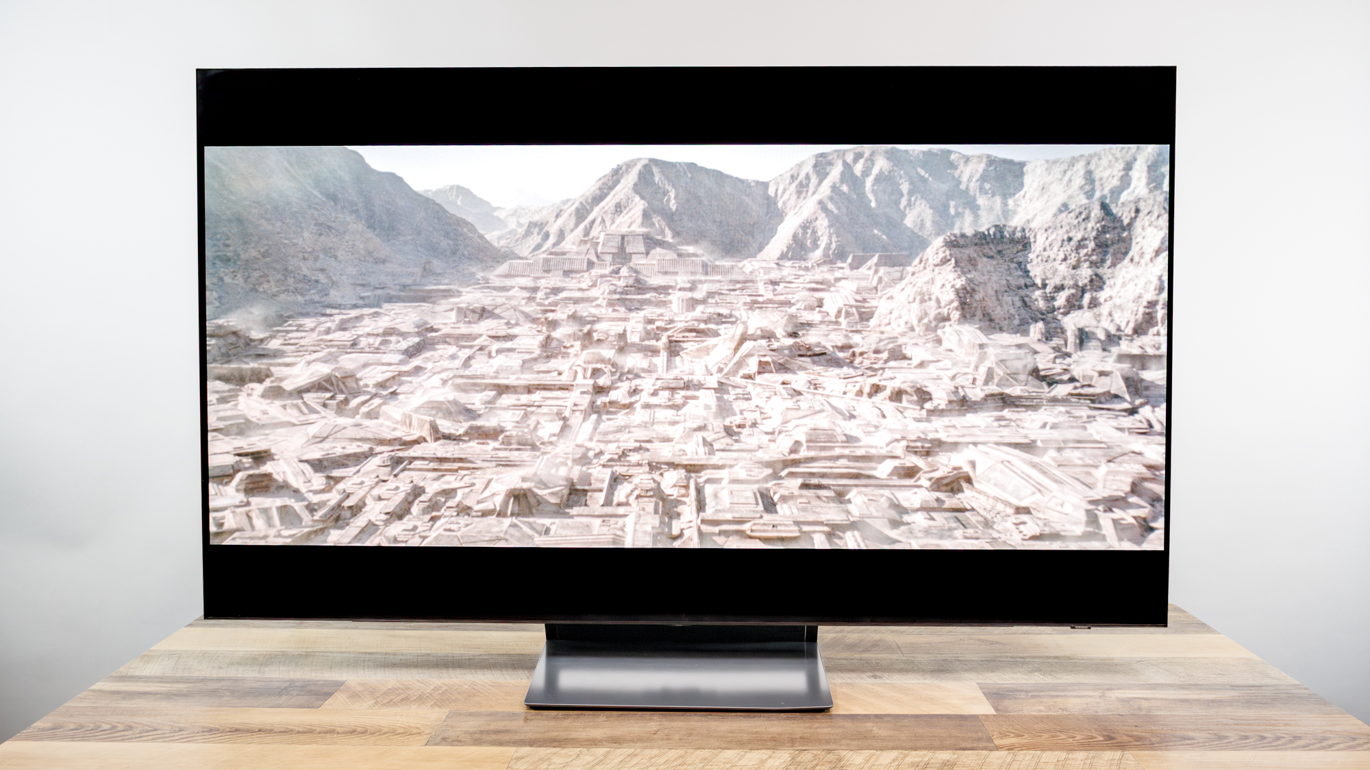 Samsung OLED S90H 4K TV on a desk