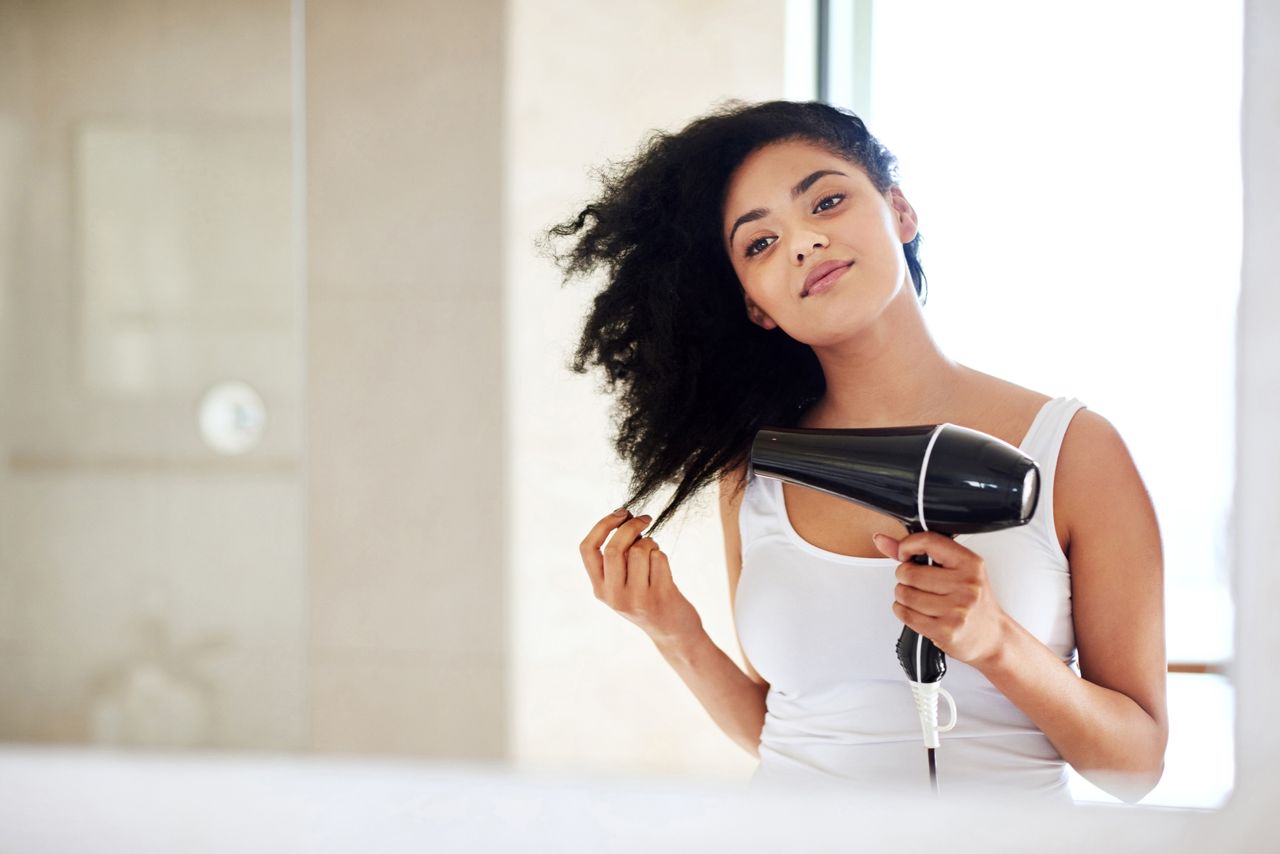 woman drying hair