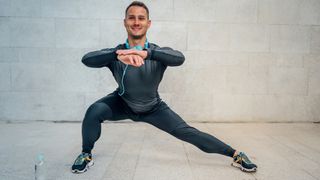 Man doing lateral lunge