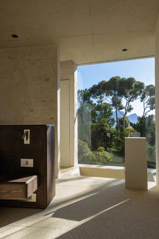 View to South African outdoors from minimalist interior