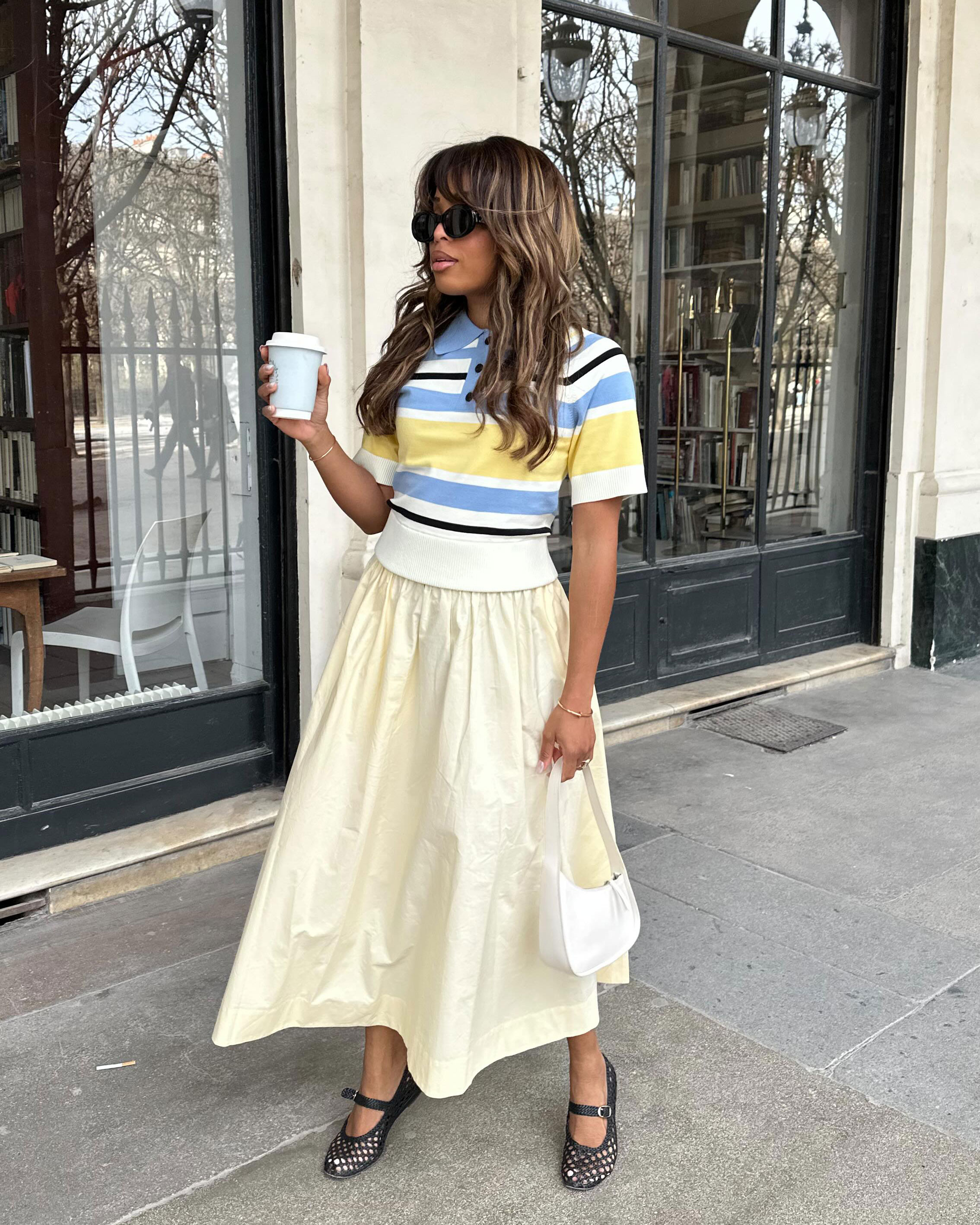 Best shoes with full skirts: @slipintostyle wears a full skirt with ballet flats