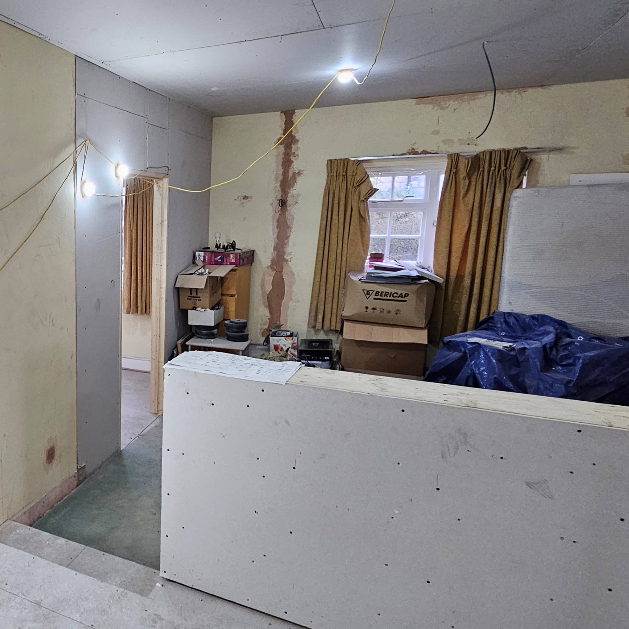renovation in progress with plaster boarded dwarf wall