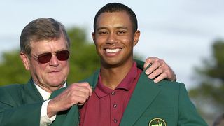 Tiger Woods receives the Green Jacket after winning the 2002 Masters at Augusta National
