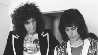 Brian May, Freddie Mercury of Queen, photo session for 'Music Life' magazine, at Hotel Pacific Tokyo on their Night At The Opera Japan tour, Tokyo, Japan, 21 March 1976