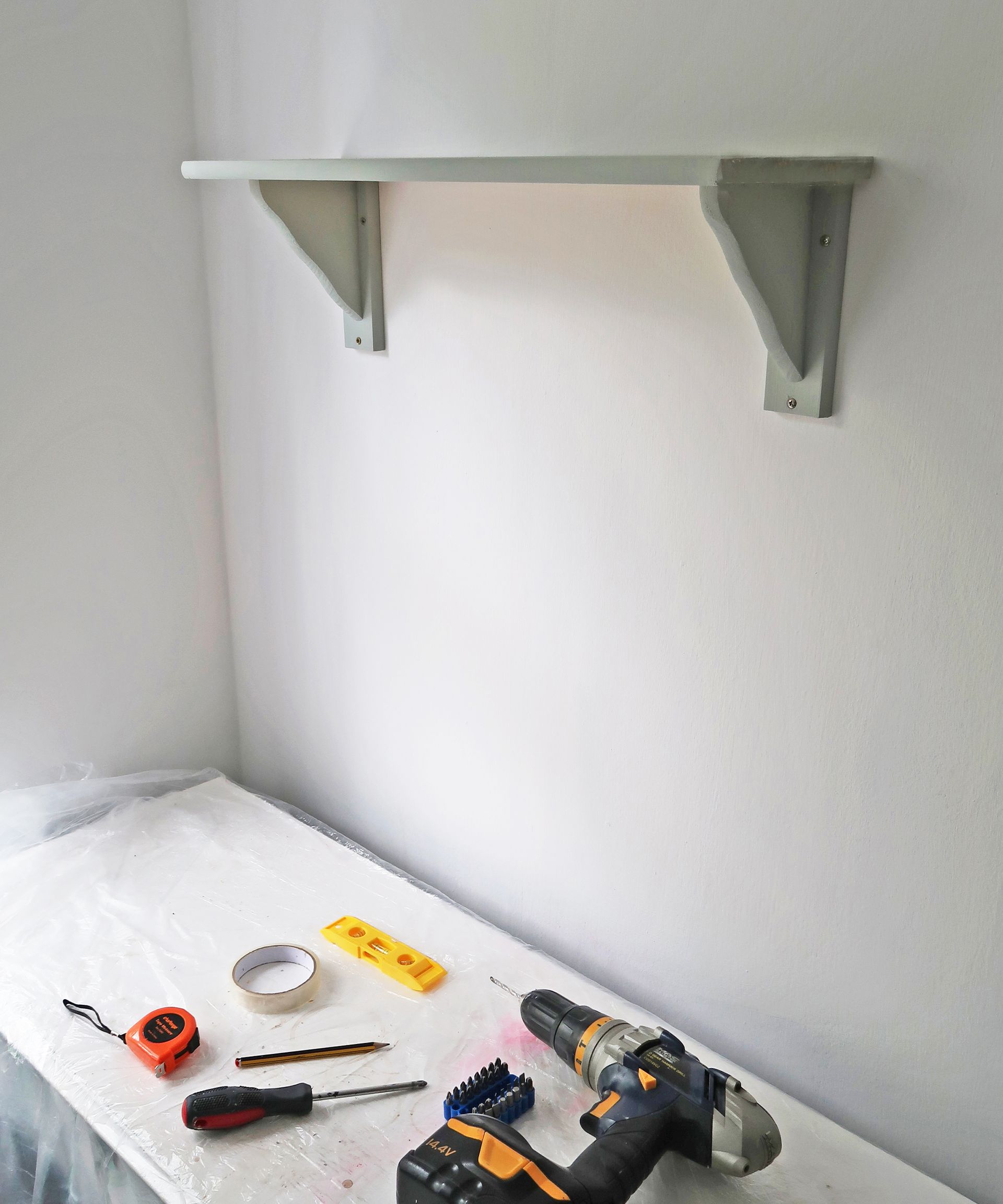 How to put up a shelf hanging shelves with brackets Real Homes