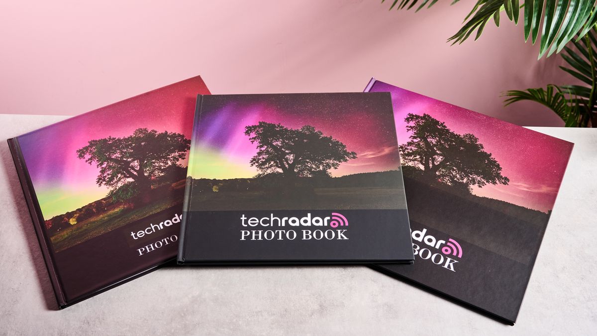 From left to right, the Shutterfly, Snapfish, and Mixbook photo books are arranged to show how much darker the Snapfish front cover is.