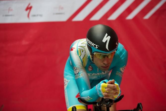 The technicians work on Nibali's bike