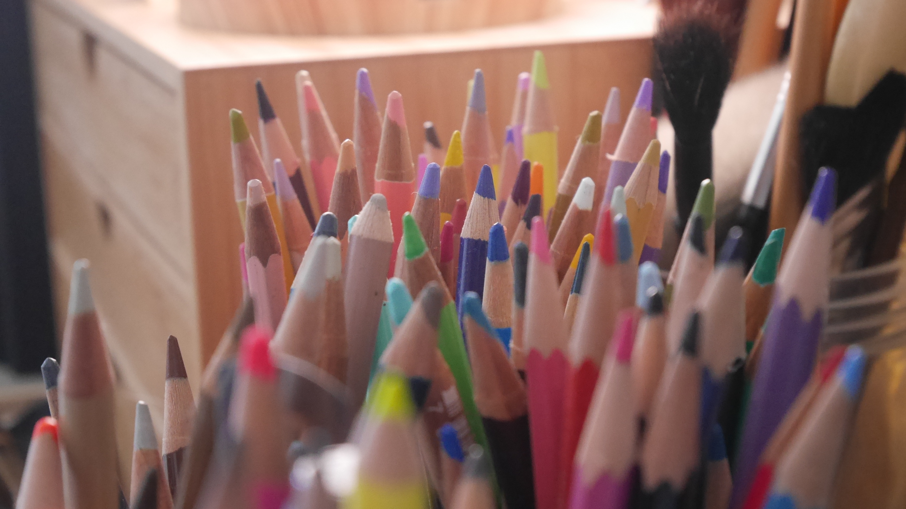 Artist in residence; A woman sits at a desk