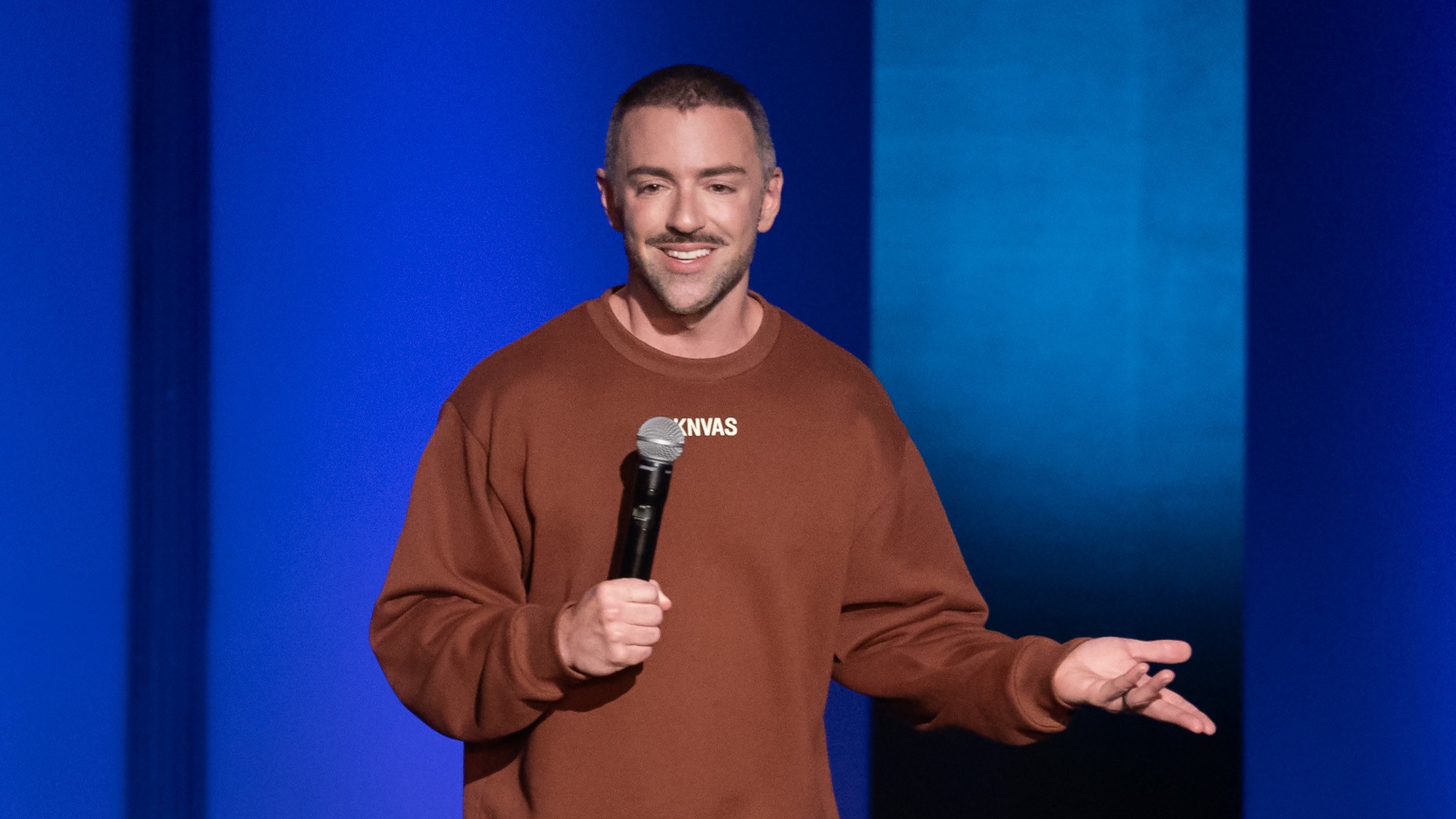 Matteo Lane performing stand-up