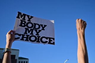 sign reading "my body my choice"