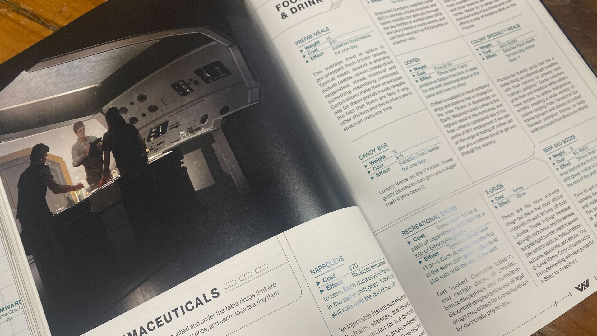 A crew of humans stand around a table in artwork surrounded by text