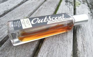 Image of brown colored liquid in a bottle.