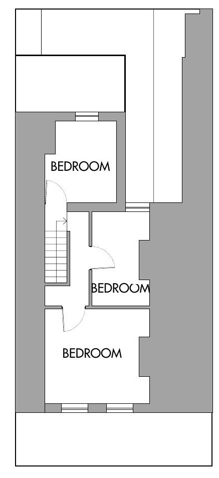 A floor plan of the first floor showing three bedrooms and a staircase.