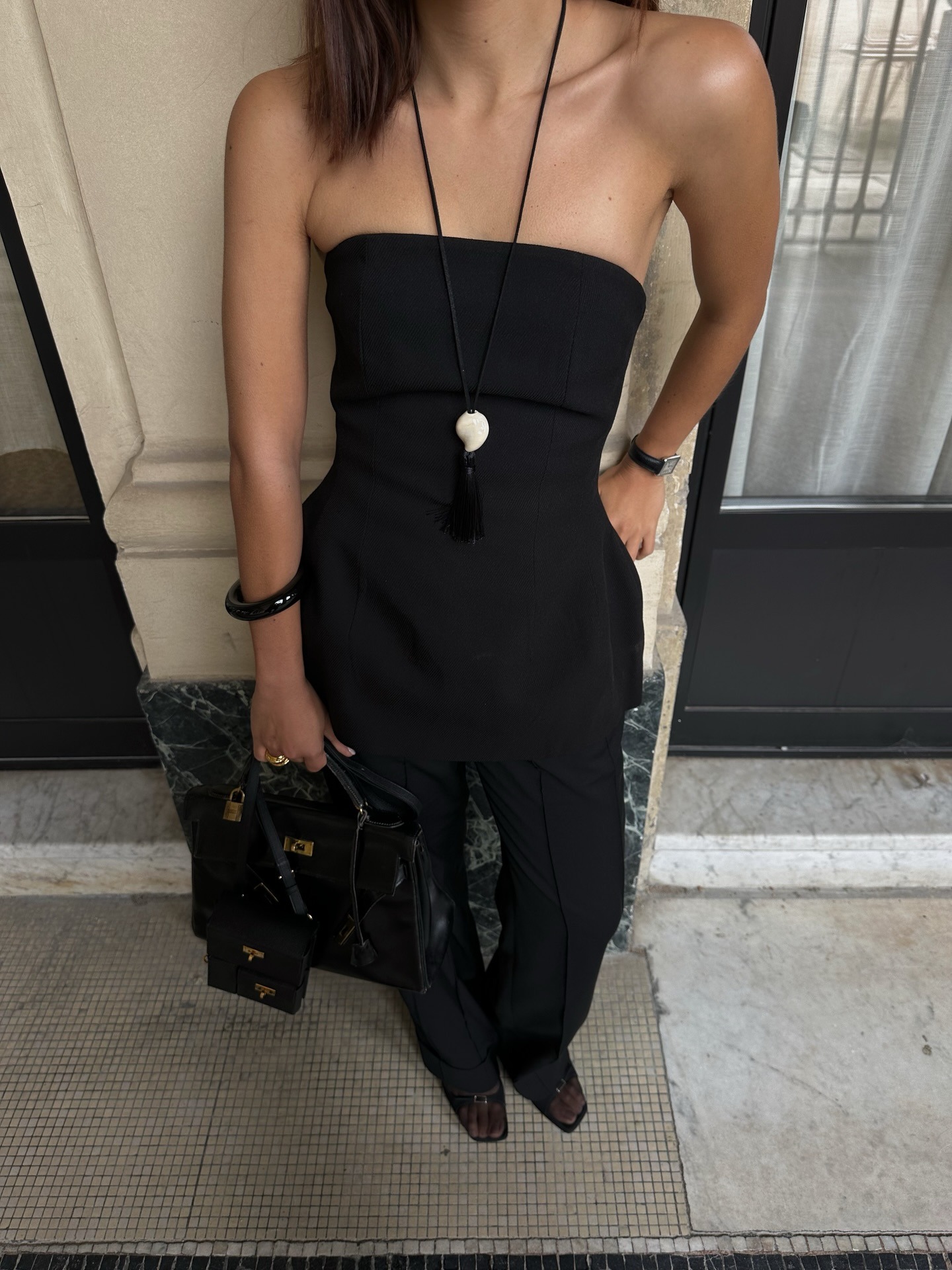 Woman wearing peplum top as a spring 2026 trend.