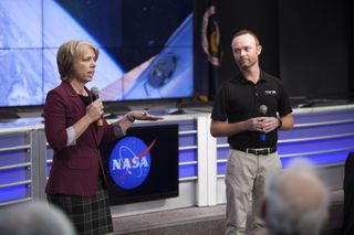 Tara Ruttley, NASA associate scientist for the International Space Station Program, left, and Patrick O'Nell, Marketing and Communications manager for the Center for the Advancement of Science in Space (CASIS), speak to members of social media in the Kenn