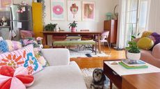 Colorful living room with dog laying on carpet