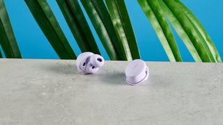 A pair of chilled lilac Bose QuietComfort Earbuds (2024)