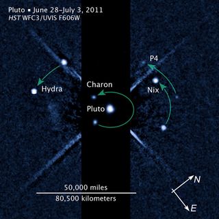 New annotated image showing Pluto and moons, including the newly discovered P4, released July 20, 2011.