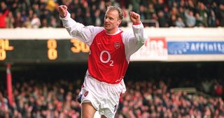 Dennis Bergkamp celebrates scoring a goal against Oxford (his 100th for Arsenal) during the FA Cup 3rd round match between Arsenal and Oxford United on January 10, 2003 in London, England.