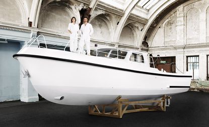 Studio Job founders Job Smeets and Nynke Tynagel stand aboard the Firmship FS 42