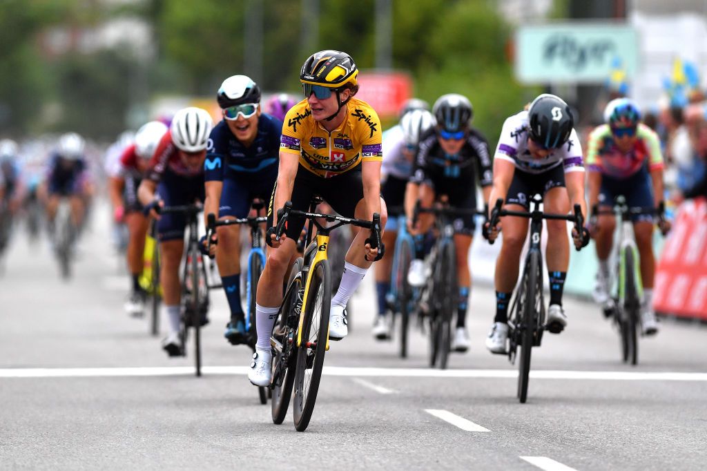 STROMSTAD SWEDEN AUGUST 10 Marianne Vos of Netherlands and Jumbo Visma Team Yellow Leader Jersey celebrates at finish line as stage winner ahead of Barbara Guarischi of Italy and Movistar Team L and Megan Jastrab of United States and Team DSM R during the 8th Tour of Scandinavia 2022 Battle Of The North Stage 2 a 1538km stage from Orust to Strmstad UCIWWT tourofscandinavia TOSC22 on August 10 2022 in Stromstad Sweden Photo by Luc ClaessenGetty Images