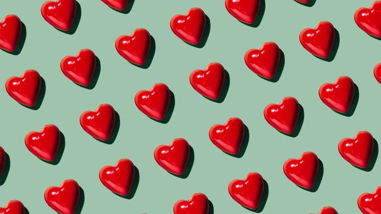 Red Hearts on Green Background