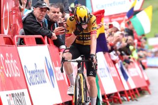 An emotional Jonas Vingegaard crosses the finish line at the Vuelta a España
