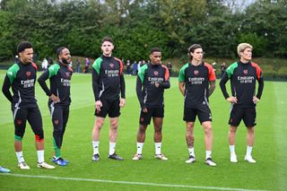 LONDON COLNEY, ENGLAND - SEPTEMBER 30: (L-R) Ethan Nwaneri, Raheem Sterling, Declan Rice, Jurrien Timber, Riccardo Calafiori and Takehiro Tomiyasu of Arsenal during the UEFA Champions League 2024/25 League Phase MD2 training and press conference at Sobha Realty Training Centre on September 30, 2024 in London Colney, England. (Photo by Stuart MacFarlane/Arsenal FC via Getty Images)