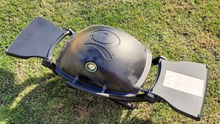 Weber Q1200 portable gas grill being tested in writer's home