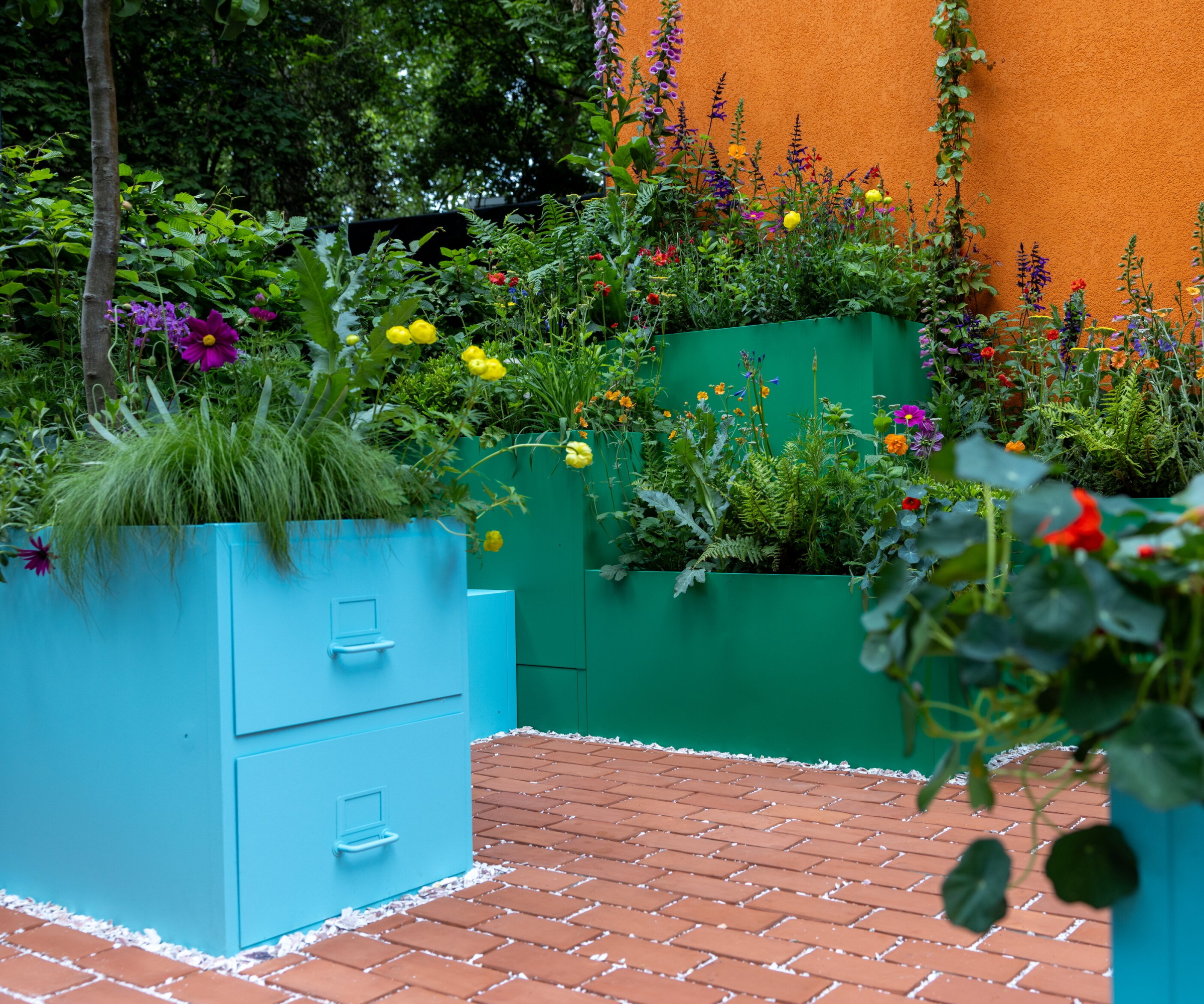 Potted up filing cabinets in The Seasalt Painted Garden, designed by Lynn James at the RHS Chelsea Flower Show 2026