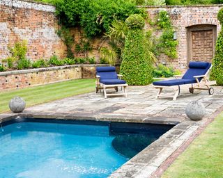 traditional walled garden with swimming pool