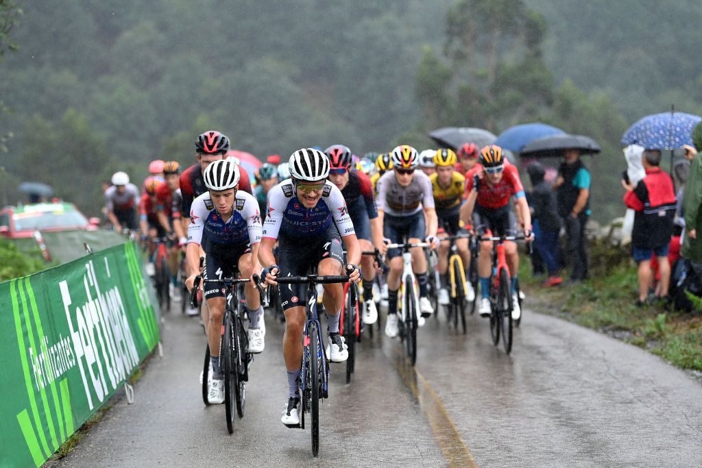 SAN MIGUEL DE AGUAYO SPAIN AUGUST 25 LR Remco Evenepoel of Belgium and Fausto Masnada of Italy and Team QuickStep Alpha Vinyl competes during the 77th Tour of Spain 2022 Stage 6 a 1812km stage from Bilbao to Ascensin al Pico Jano San Miguel de Aguayo 1131m LaVuelta22 WorldTour on August 25 2022 in Pico Jano San Miguel de Aguayo Spain Photo by Justin SetterfieldGetty Images