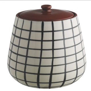 grid pattern and elliot storage jar with white background