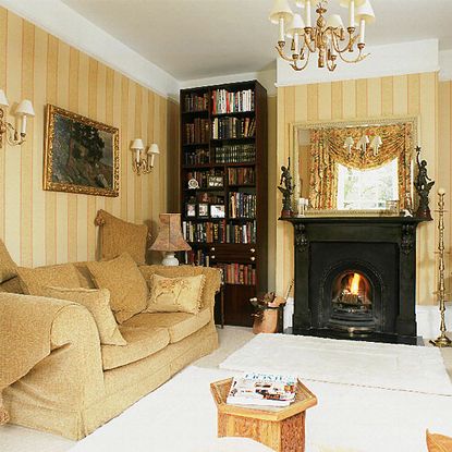 living room with fireplace and sofa